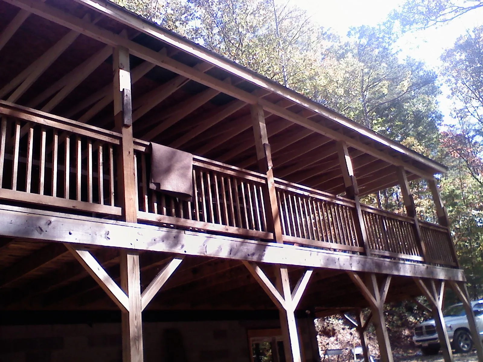 Timber framing under a new elevated porch and deck — Roof Leak Repair in Henefer by Roofing Brothers